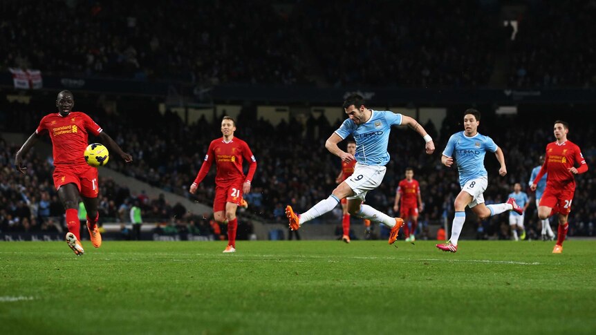 Manchester City's Alvaro Negredo scores his team's second goal against Liverpool.