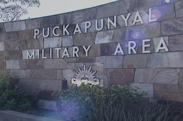 A block wall with punckpunyal camp base in big letters on it.