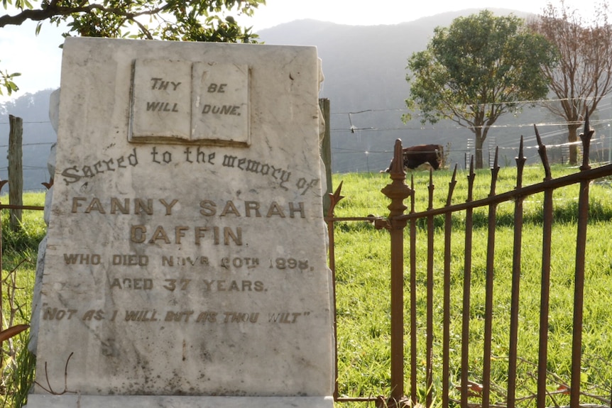 An old gravestone in church grounds