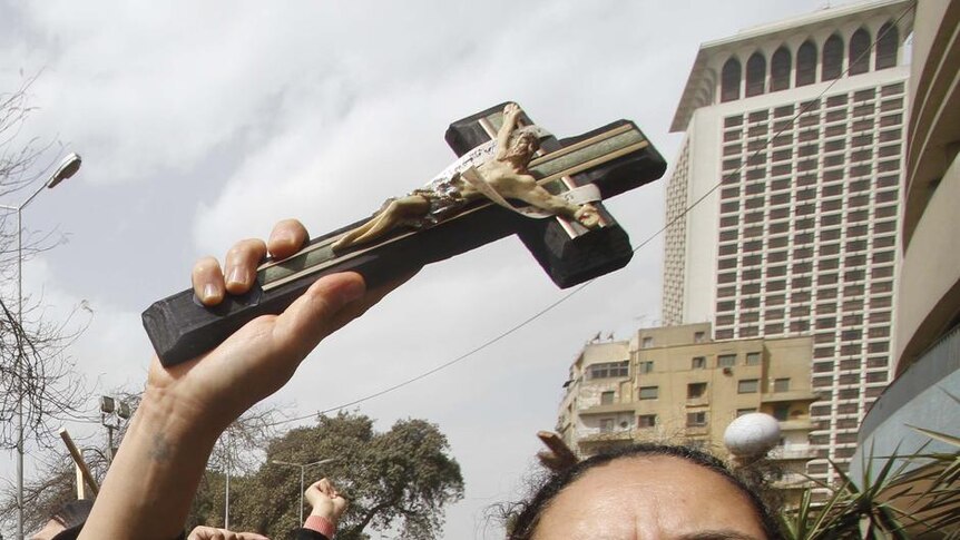Egyptian Coptic Christians protest the burning of a church last week