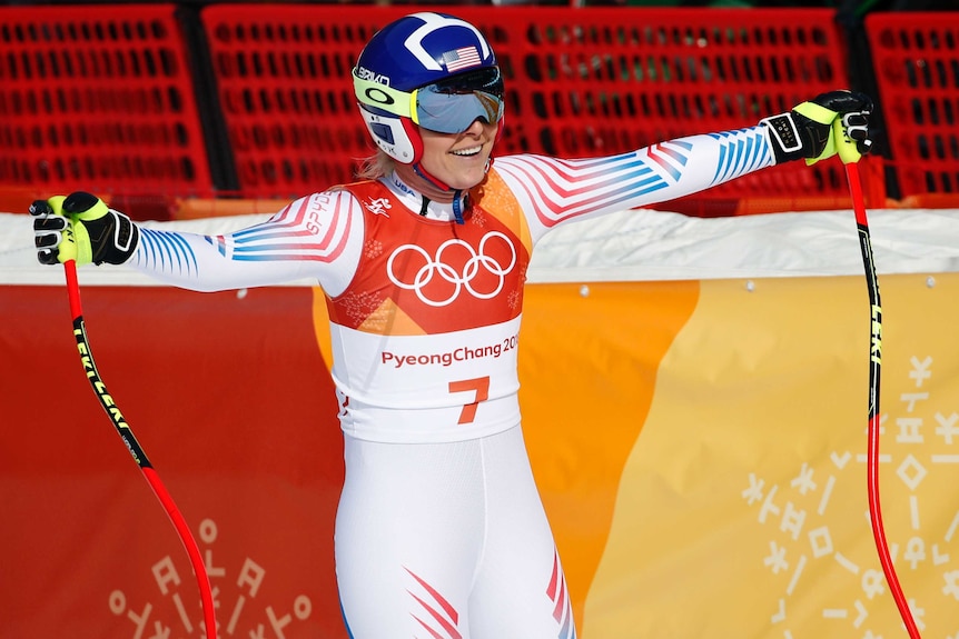 Lindsey Vonn  smiling after completing her run in the women's downhill at the Olympic Winter Games.