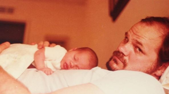 Meghan Markle as a baby with her father Thomas.