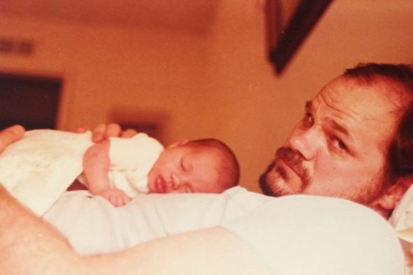 Meghan Markle as a baby with her father Thomas.