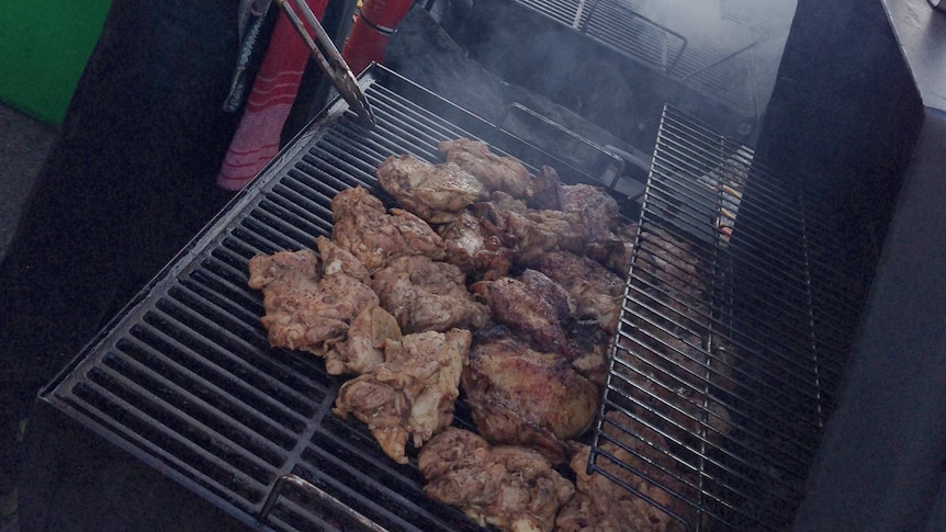 Smoking jerk chicken at the Vic Park hawkers markets