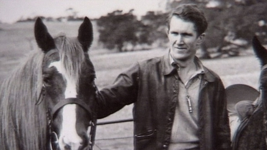 Malcolm Fraser pats a horse