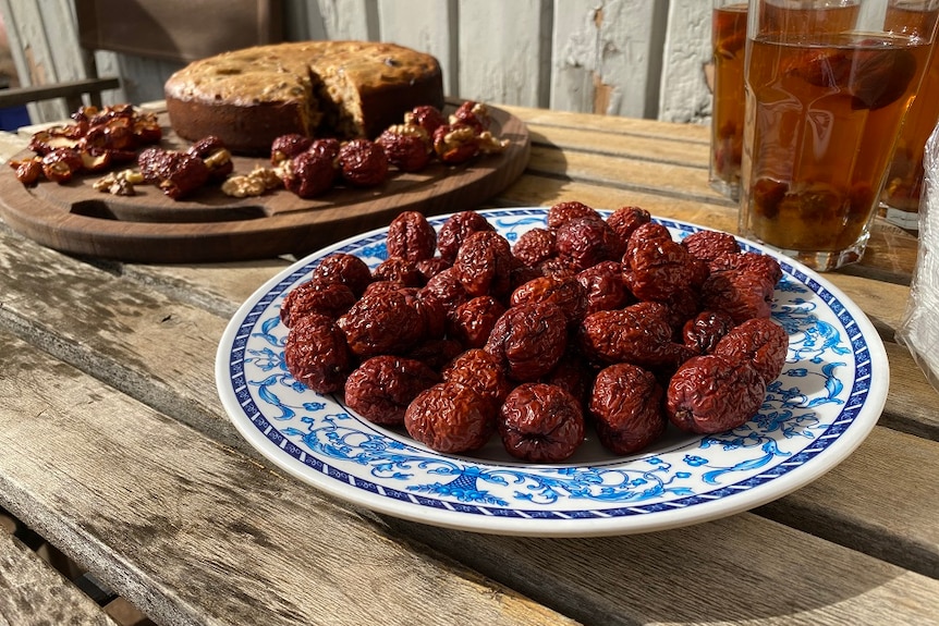 Dried jujube and cake on a table.