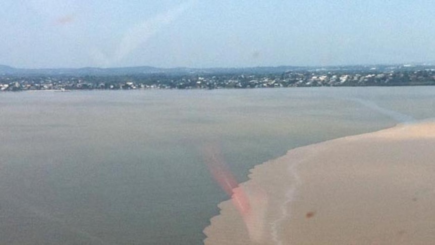 Silt and mud from the floods that swept through Brisbane and Ipswich spreads out over Moreton Bay