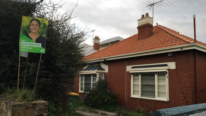 A house with a Alex Bhathal election sign in the yard.