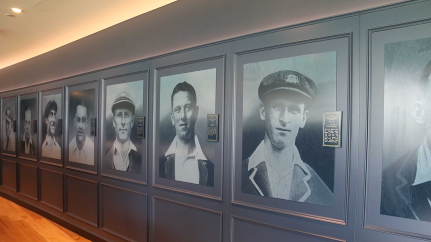 Portraits of cricketers line the wall at Adelaide Oval.