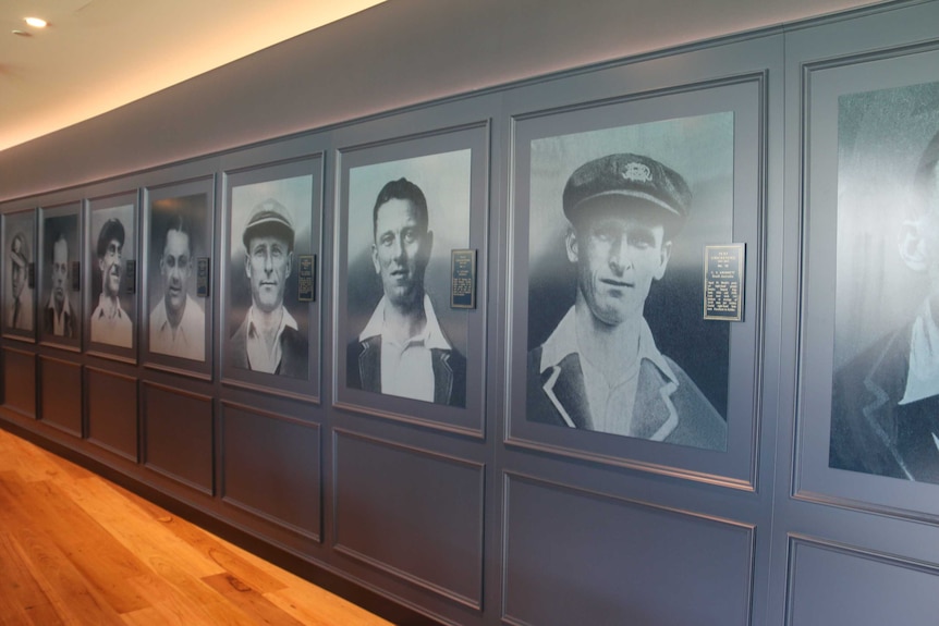 Portraits of cricketers line the wall at Adelaide Oval.