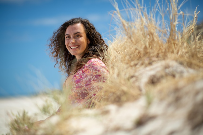 Adelaide influencer Chloe Grayling at a beach.