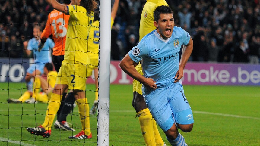 Manchester City forward Sergio Ageuro celebrating after last minute winner against Villarreal