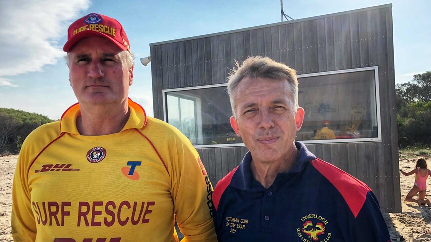 Rob O'Neill and Peter Harrison standing in front of the Inverloch Lifesaving Club.