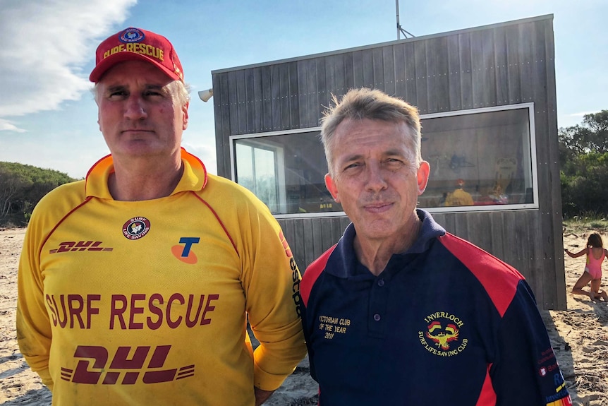 Rob O’Neill and Peter Harrison standing in front of the Inverloch Lifesaving Club.