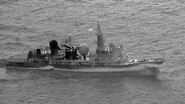 A black and white photo of a Chinese navy ship.