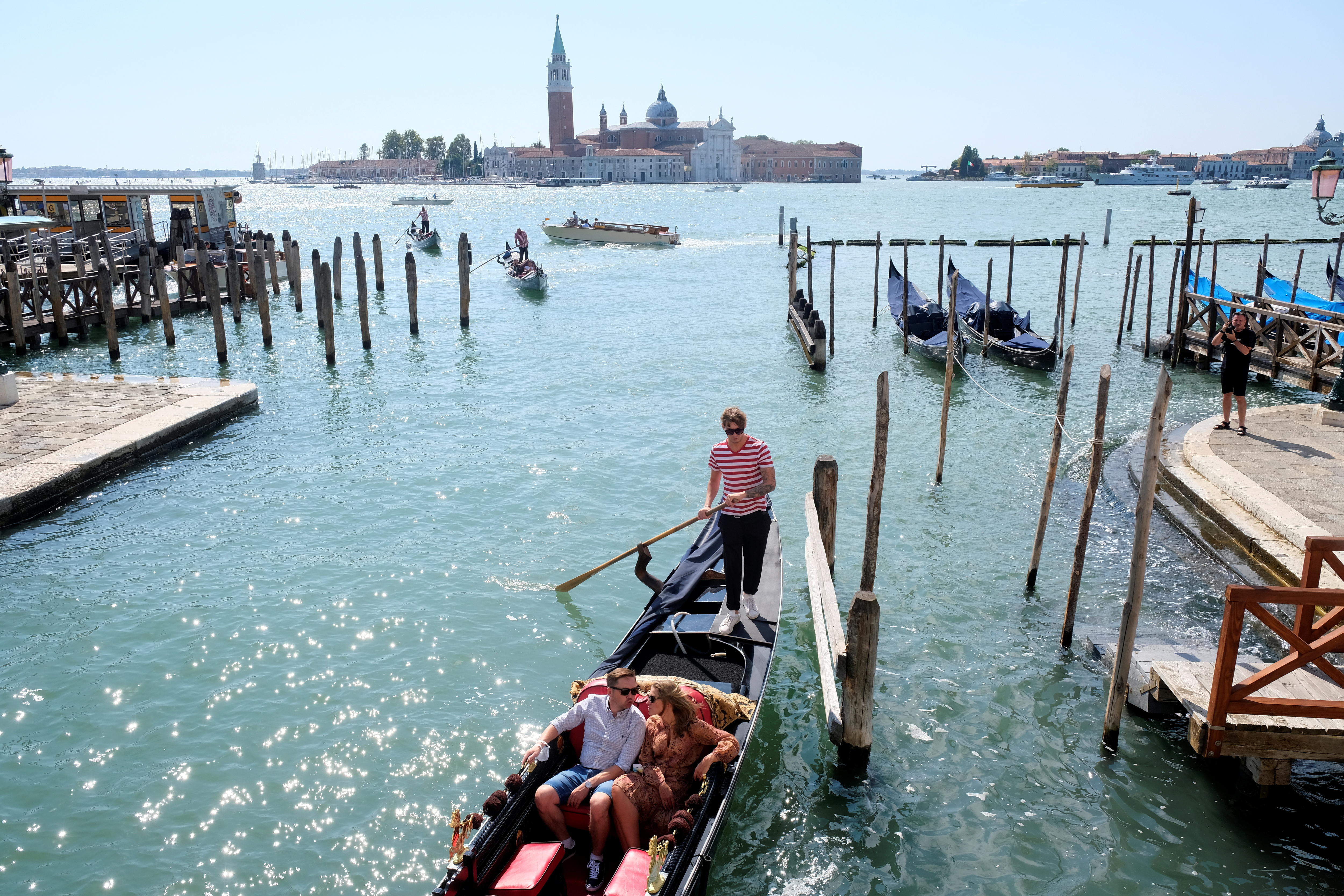 A couple on a gondola ride.
