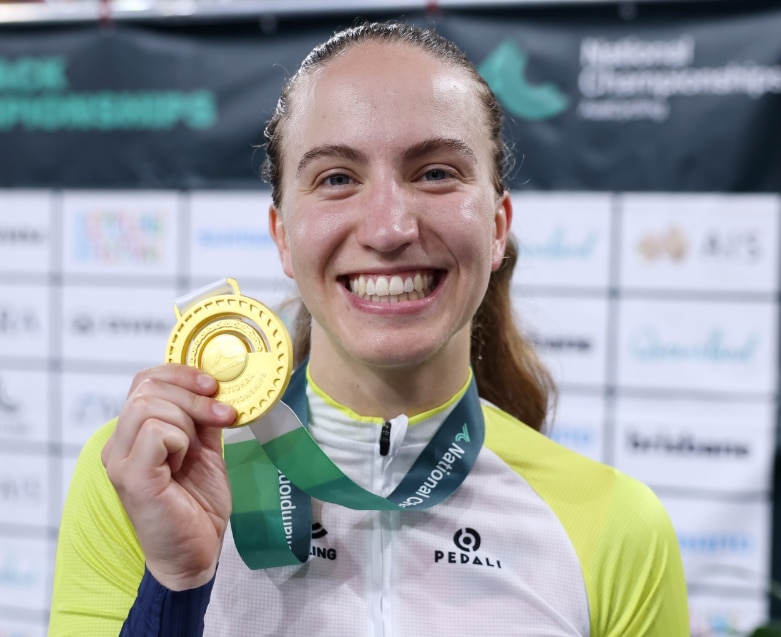 Sophie Edwards holds a medal