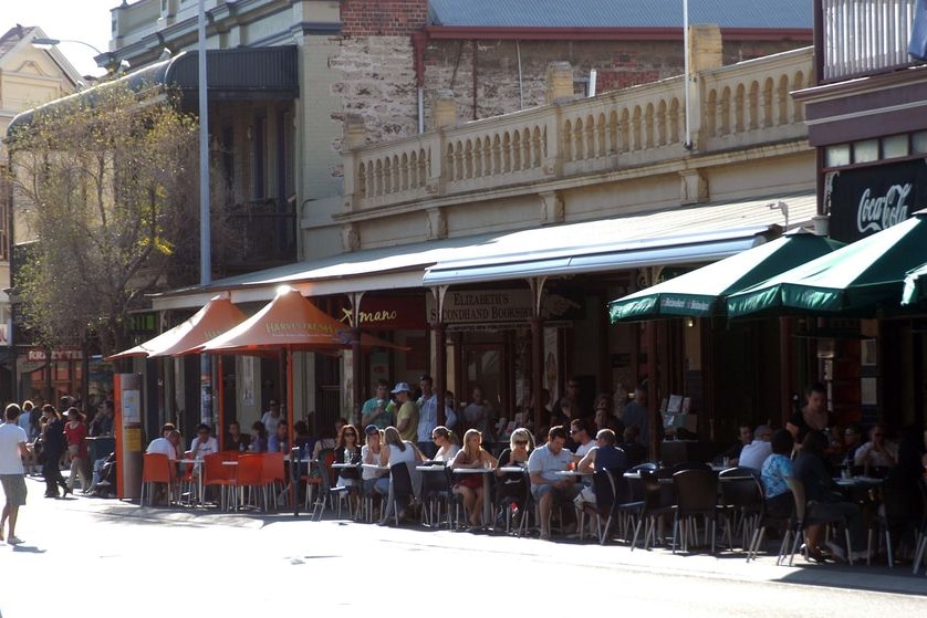 Locals and tourists enjoy the sunshine as they dine along the 'capuccino strip' in Fremantle