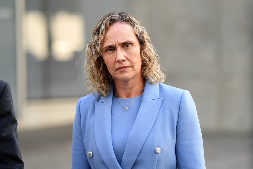 Headshot of former Queensland police officer Michelle Stenner outside the District Court in Brisbane.