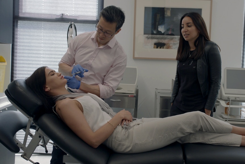 Emily Patrickson in Gavin Chan's consulting room with Antoinette Lattouf