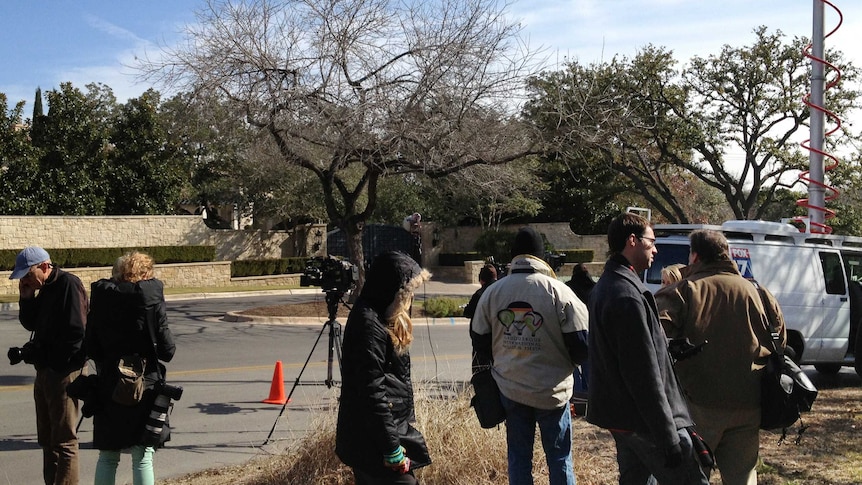 Reporters gather in front of Lance Armstrong's house in Austin, Texas.