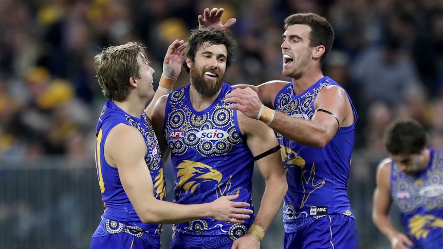 Josh Kennedy congratulated by West Coast teammates