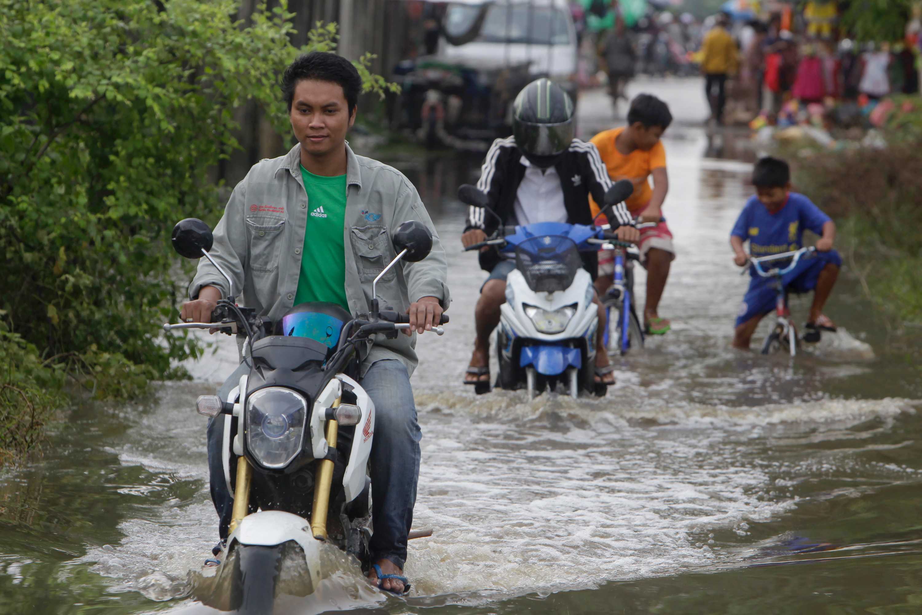 Flooding in SouthEast Asia leaves at least 20 dead, thousands homeless