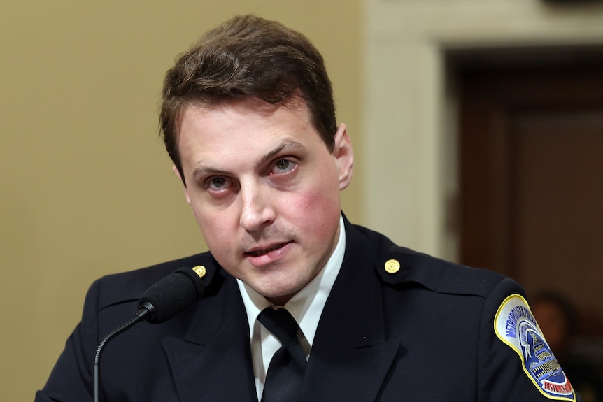 Washington Metro Police officer Daniel Hodges appears angry as he testifies.