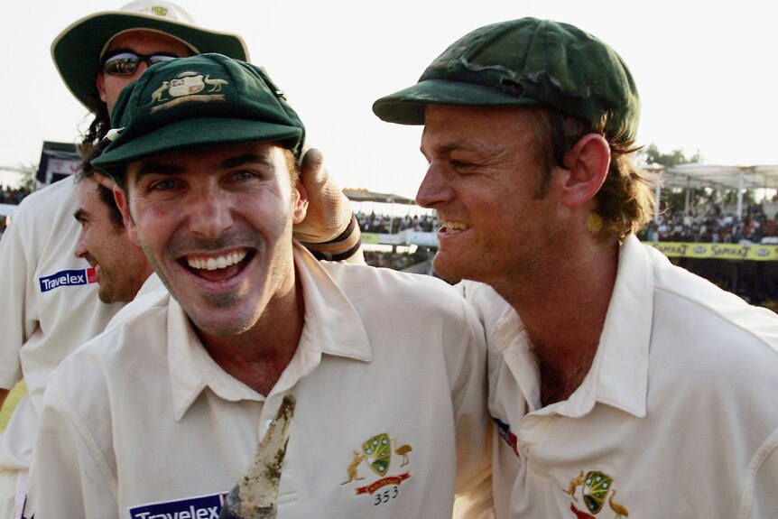 Adam Gilchrist grins at Damien Martyn, who smiles