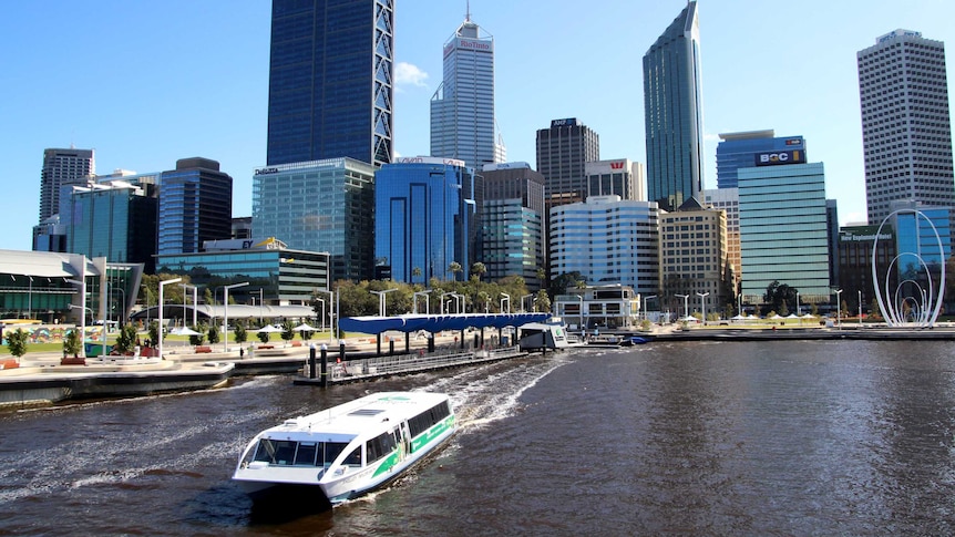 A ferry departs Elizabeth Quay with Perth skyline in background