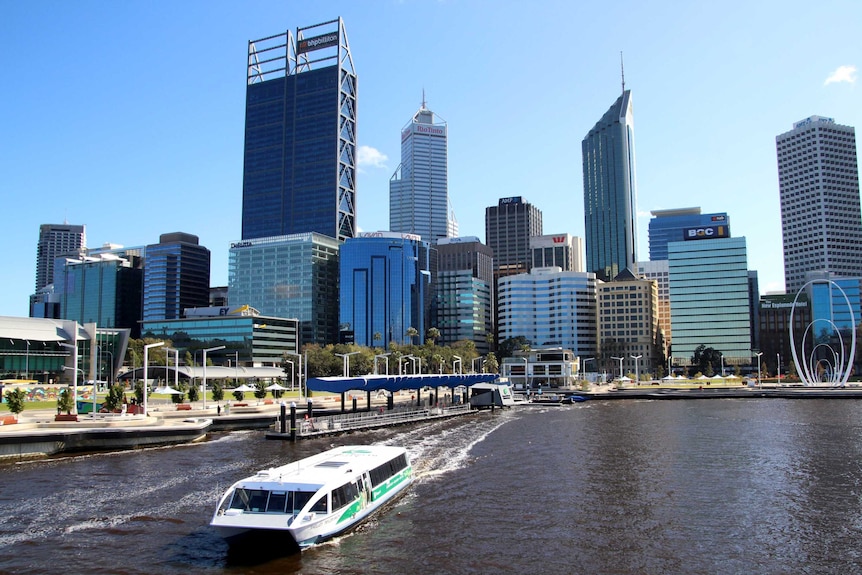 A ferry departs Elizabeth Quay with Perth skyline in background