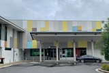 A building with mult-coloured exterior. 