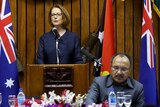 Julia Gillard speaks as Peter O'Neill listens.