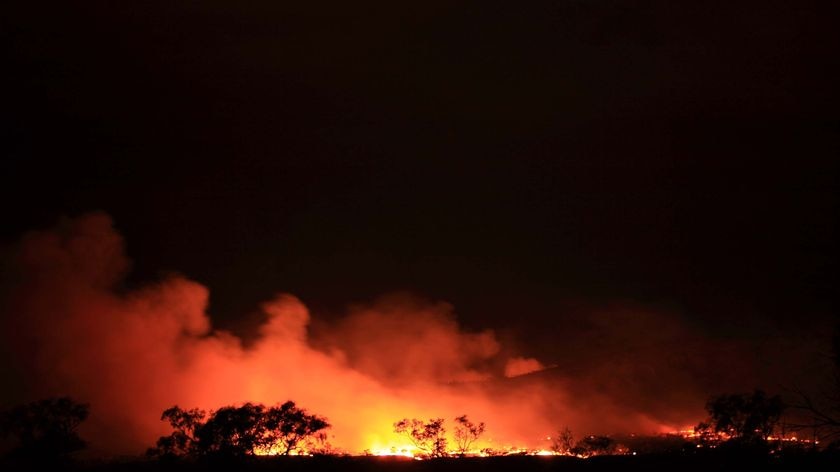 A bushfire near Dales's Gorge, Karijini, northern WA, glows in the night sky