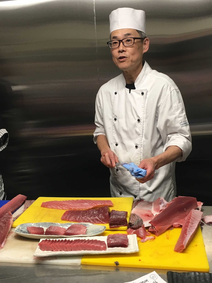 Sushi chef Toshihiko Oe performing a private sashimi cutting display at Bar Wa Izikaya in Hobart.