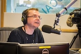Spencer Howson in a radio studio.