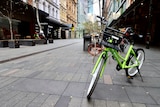 Share bicycles sit amid an empty Pitt Street mall during Sydney's lockdown.