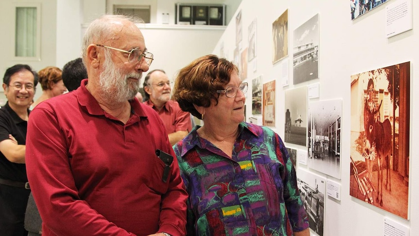 Punters at exhibition of old photographs