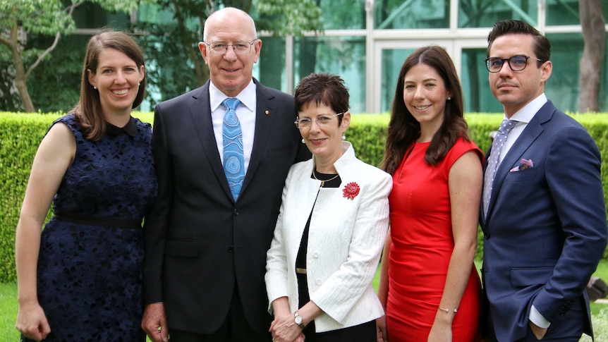 Governor Hurley and his family pose for a photo in one of the courtyards of Parliament House.