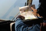 Search crews hunt for missing Malaysia Airlines plane