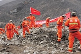 Rescuers search for survivors after landslide in Tibet