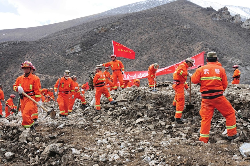 Rescuers search for survivors after landslide in Tibet