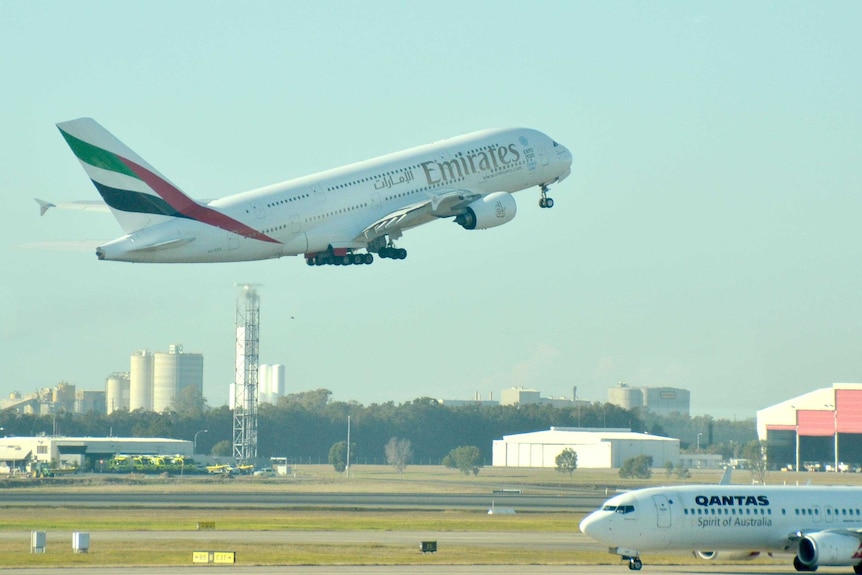 Emirates A380 and Qantas plane