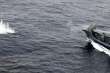 The Japanese whaling fleet hunt a whale in the Southern Ocean.