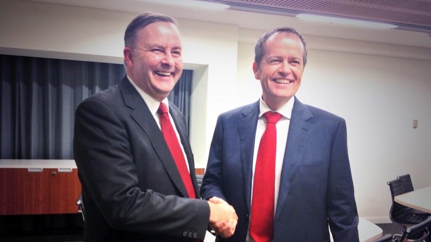 Anthony Albanese and Bill Shorten shake hands before the Labor leadership debate