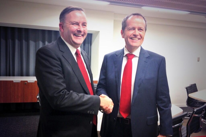 Anthony Albanese and Bill Shorten shake hands before the Labor leadership debate