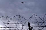 A plane takes off from Bagram Air Base