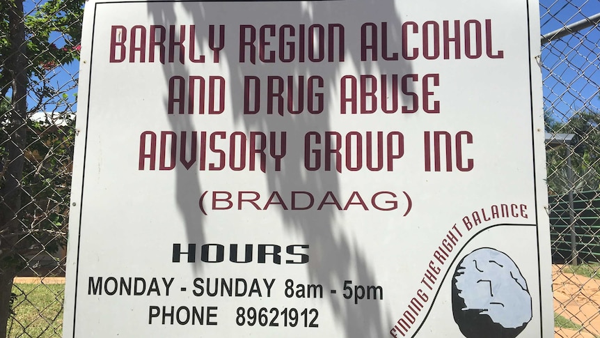 A white sign with red writing reads: Barkly Region Alcohol and Drug Abuse Advisory Group.