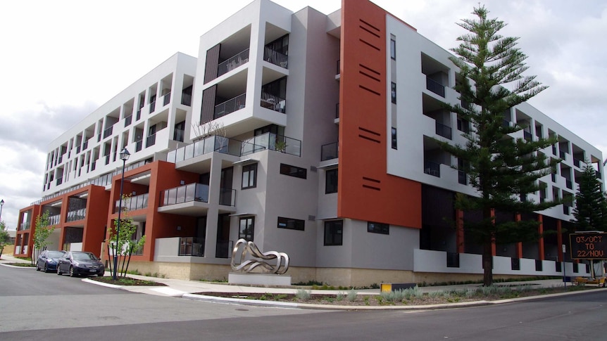 A modern five-storey apartment complex.