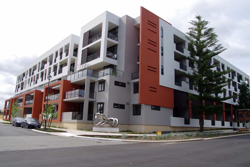 A modern five-storey apartment complex.